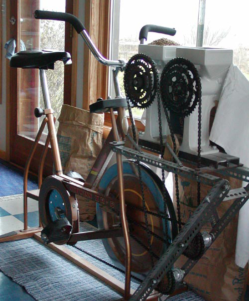 Converted her exercycle so that it would grind two Country Living Mills simultaneously!