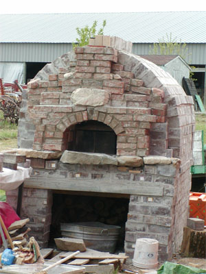 I love when I have done several bakes in my outdoor brick oven and I have all that bread cooling and it smells so good